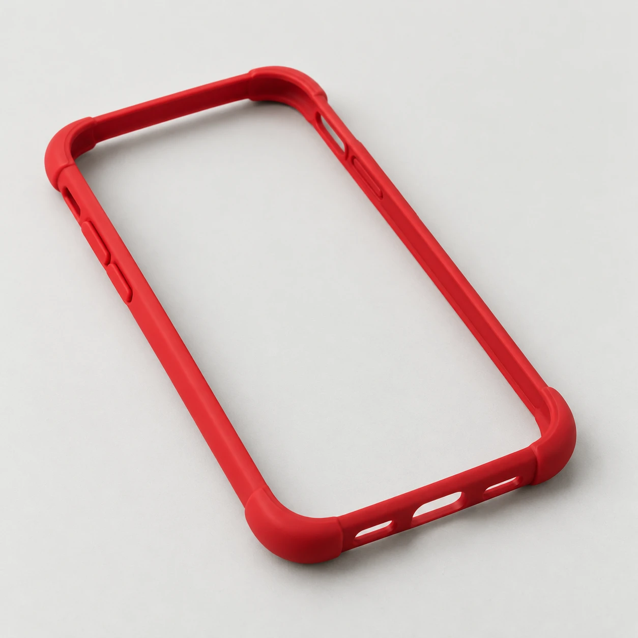 Red silicone phone bumper with reinforced corners and an entirely open back.